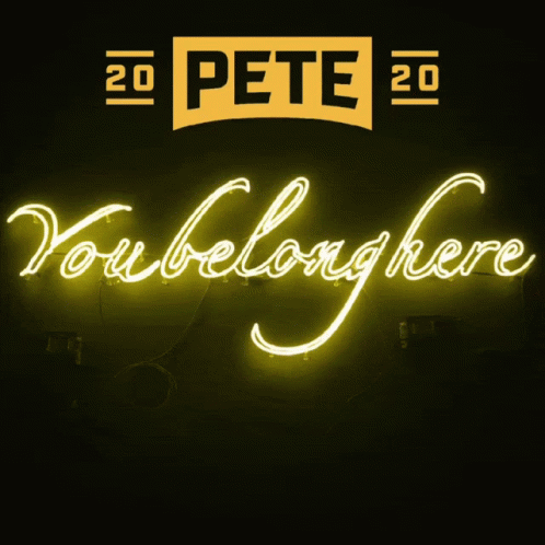 A Neon Sign That Reads You Belong Here GIF