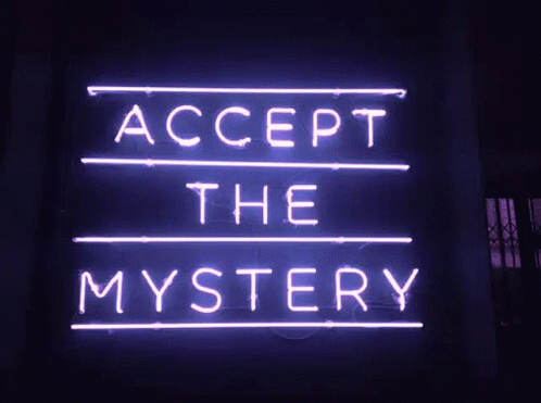 A Neon Sign That Says Accept The Mystery Is Lit Up GIF