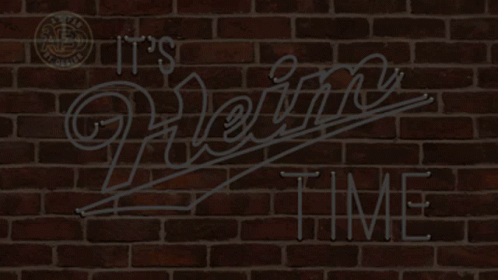 A Neon Sign That Says " It 'S Heinz Time " On A Brick Wall GIF