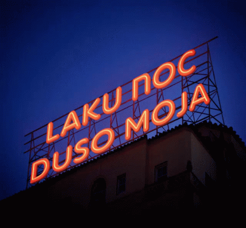 A Neon Sign That Says Laku Noc Dusomoja GIF