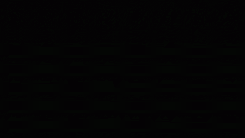 A Neon Sign That Says Rt San Antonio After Dark In Front Of A Group Of People GIF