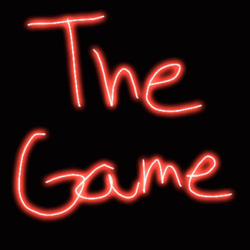 A Neon Sign That Says The Game In Red GIF