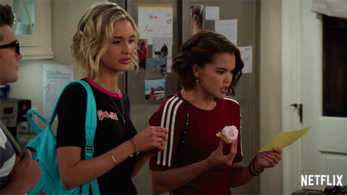 Girl Holding Pink Cupcake Netflix Ad GIF