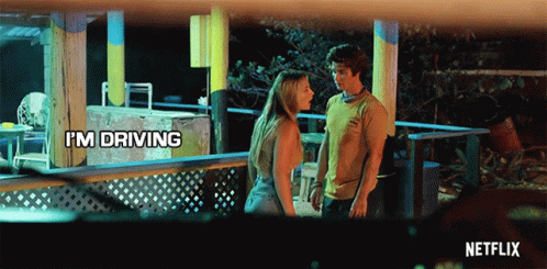 A Netflix Ad Shows A Man And A Woman Standing On A Porch GIF