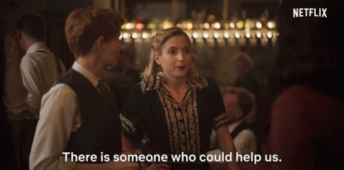 A Netflix Ad Shows A Man And A Woman Talking In A Bar GIF