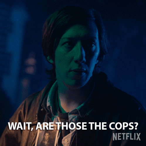 A Netflix Ad Shows A Man In A Dark Room With The Caption Wait Are Those The Cops GIF