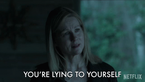 A Netflix Ad Shows A Woman Crying And The Words " You 'Re Lying To Yourself " GIF