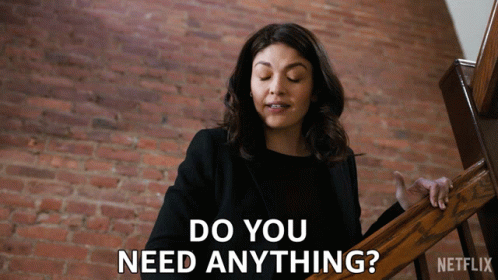 A Netflix Ad Shows A Woman Holding A Railing And Asking " Do You Need Anything " GIF