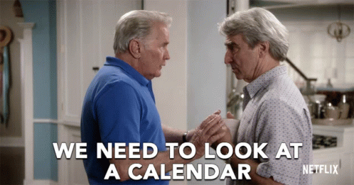 A Netflix Ad Shows Two Men Looking At A Calendar GIF