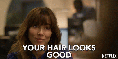 A Netflix Ad With A Woman And The Words Your Hair Looks Good GIF