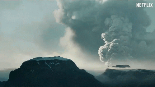 A Netflix Advertisement Shows A Volcano Erupting With Smoke Coming Out Of It GIF