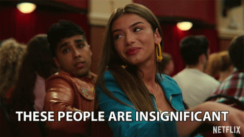 A Netflix Advertisement Shows A Woman And A Man And Says These People Are Insignificant GIF