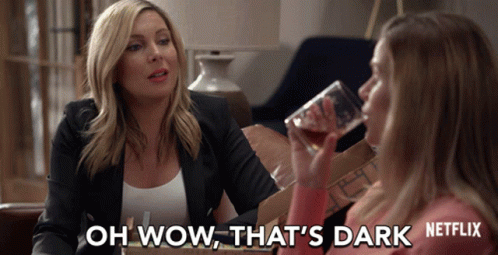 A Netflix Advertisement Shows Two Women Talking And One Drinking From A Glass GIF