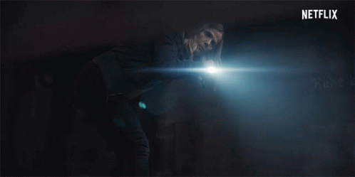 A Netflix Logo Is Displayed In The Dark GIF
