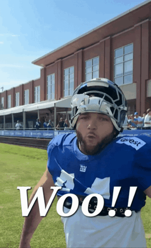 a new york giants football player says woo on the field