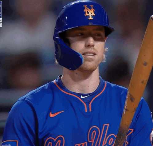 A New York Mets Baseball Player Holds A Bat GIF