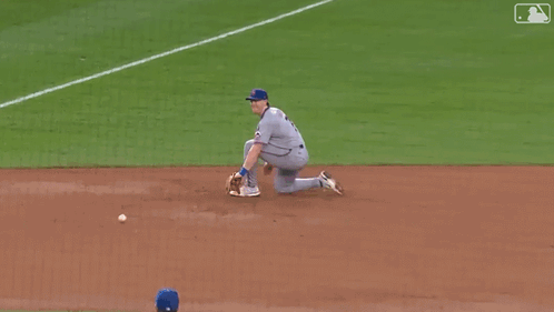 A New York Mets Pitcher Is Throwing A Baseball GIF