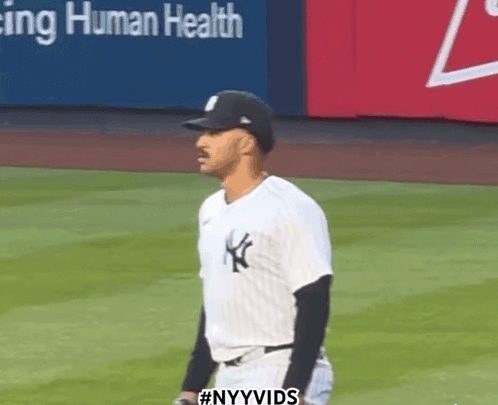 A New York Yankees Player Stands On The Field GIF