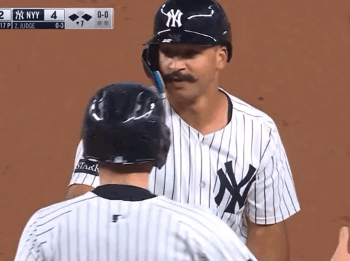 A New York Yankees Player Talks To A Referee GIF