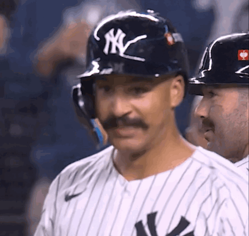 A New York Yankees Player With A Mustache Wears A Helmet GIF
