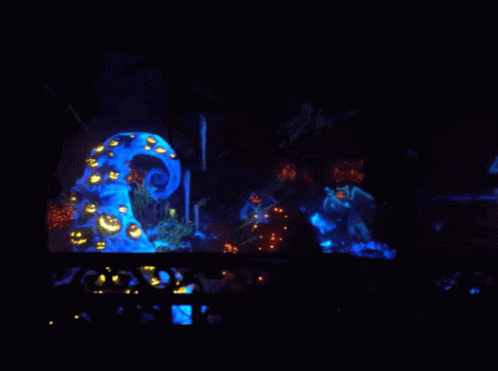 A Nightmare Before Christmas Scene With Pumpkins And A Tree GIF