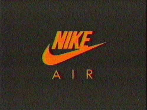 A Nike Air Logo On A Dark Background GIF