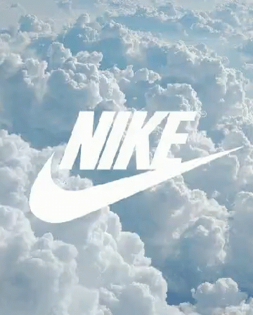 A Nike Logo Is Displayed Over A Blue Ocean GIF