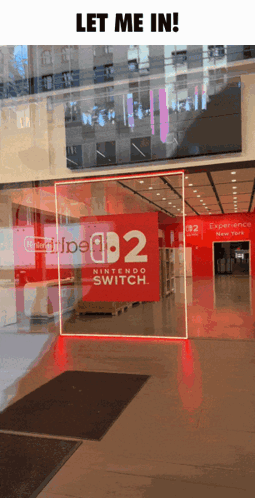A Nintendo Switch Store In New York With A Sign That Says " Let Me In " GIF