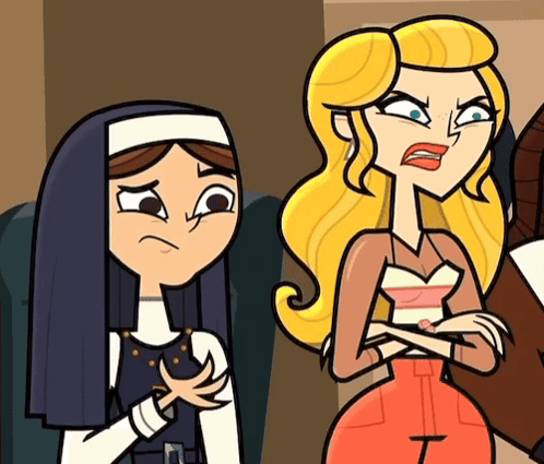 A Nun And A Blonde Woman Are Standing Next To Each Other With Their Arms Crossed GIF