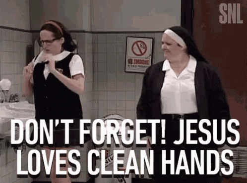 A Nun Is Standing Next To A Girl In A Bathroom And Saying `` Don T Forget ! Jesus Loves Clean Hands '' GIF