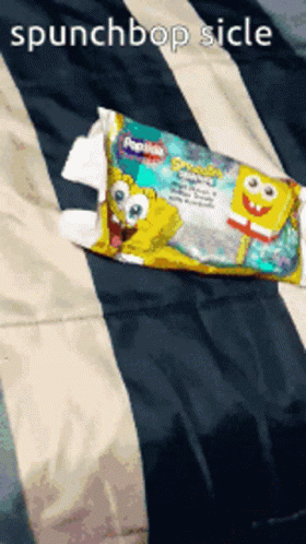 A Pack Of Spongebob Wipes Is On A Bed GIF