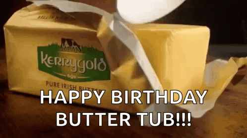 A Package Of Kerrygold Butter Is Being Opened And Says Happy Birthday Butter Tub GIF