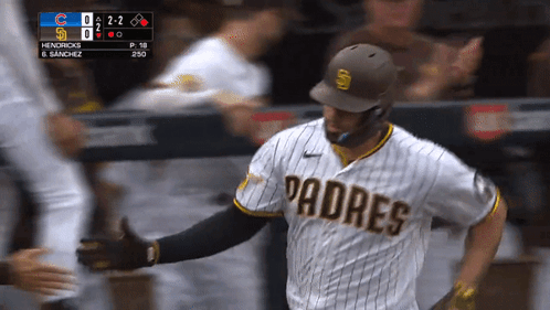 A Padres Baseball Player Giving A High Five GIF
