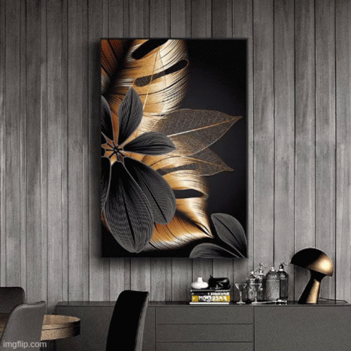 A Painting Of A Black And Gold Flower Hangs On A Wall GIF