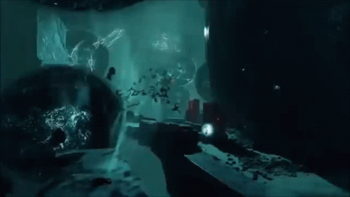 A Painting Of A Cave With A Lot Of Rocks GIF
