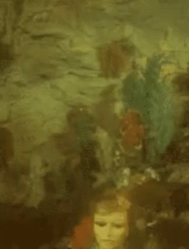 A Painting Of A Coral Reef With A Few Fish In It GIF