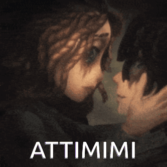 Kissing Man And Woman With Attimii Text GIF