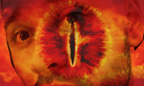 A Painting Of A Man 'S Face With A Cross On It GIF