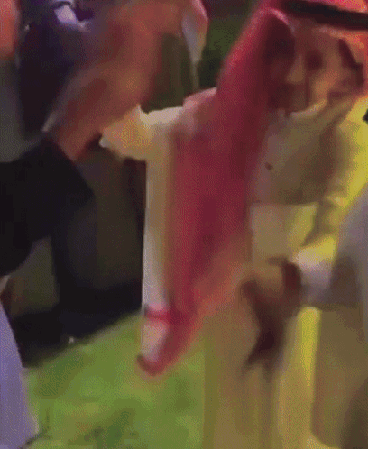 A Painting Of A Man Wearing A Turban And A Red Head Scarf GIF