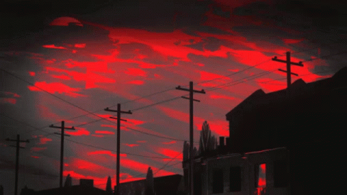 A Painting Of A Red Sky With Telephone Poles GIF