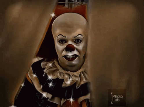 A Painting Of A Scary Clown Is Displayed On A Photo Lab Page GIF