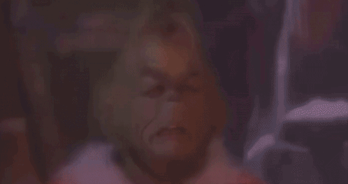 A Painting Of A Sunset With A Large Red Sun Shining Through The Clouds . GIF
