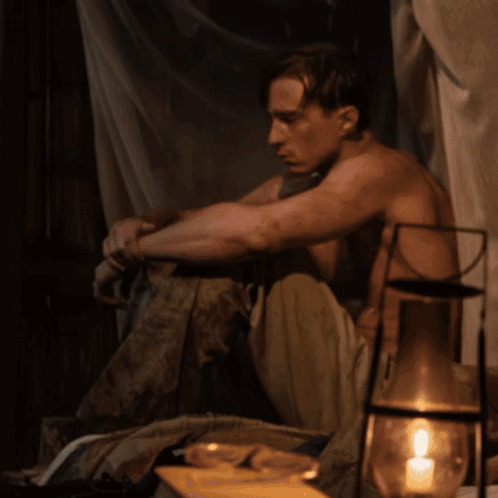 A Painting Of A Werewolf Sitting On A Rock Looking At The Ocean GIF