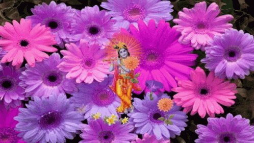 A Painting Of A Woman Surrounded By Purple And Pink Flowers GIF
