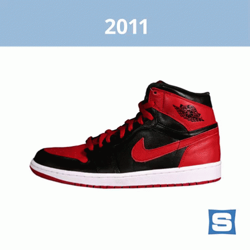 A Pair Of Black And Red Air Jordan Shoes From 2011 GIF
