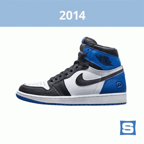 A Pair Of Black And White Nike Shoes With The Year 2014 On The Bottom GIF