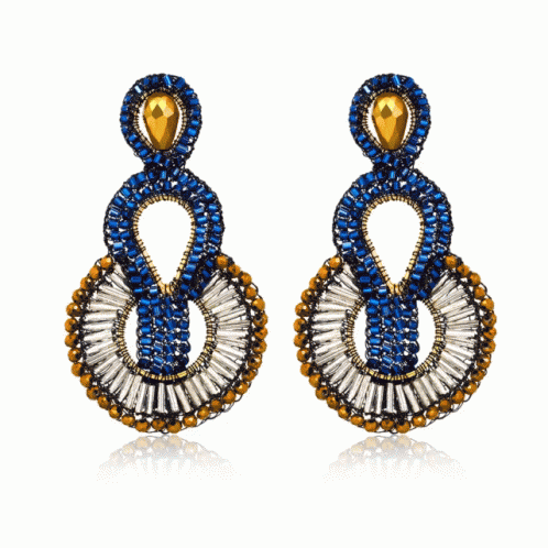 A Pair Of Earrings With Blue And White Beads GIF