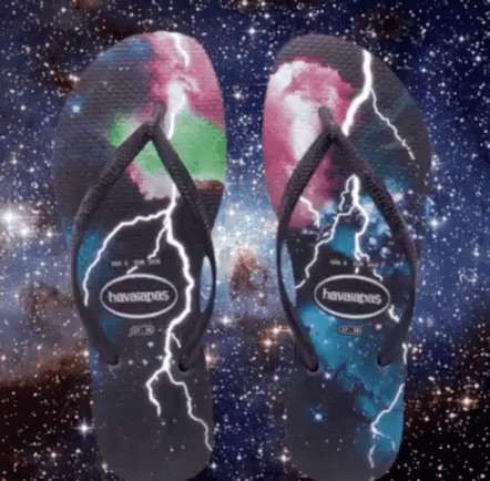 A Pair Of Havaianas Flip Flops With A Lightning Design On Them GIF