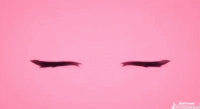 A Pair Of Pink Anime Eyes With A Smiley Face On A Pink Background . GIF
