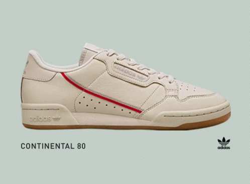 A Pair Of Purple Adidas Continental 80 Sneakers On A Grey Background GIF
